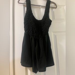 Free people short black romper. Worn once. I’m perfect condition